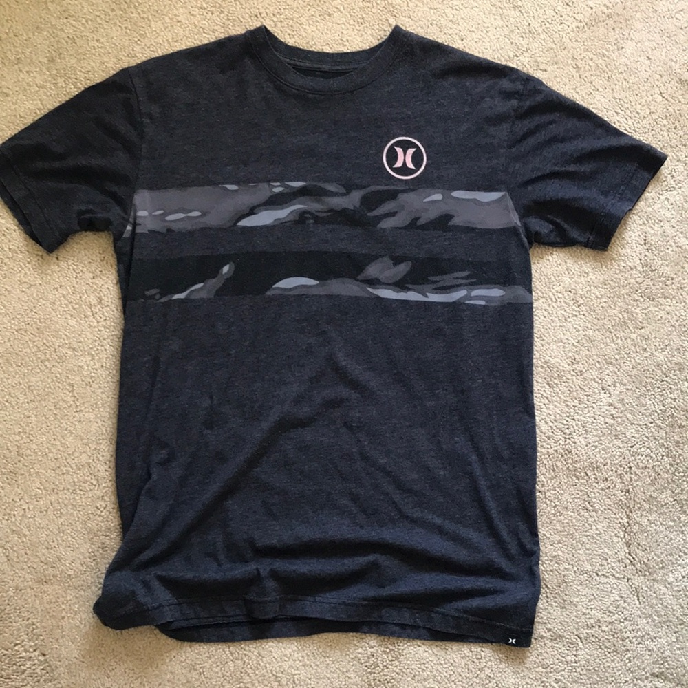 This is a mens medium Hurley brand short sleeve shirt.